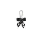 COACH Women's Collectible Signature Jewelry Charm - color: Pearl Bow Black/Rhodium