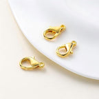 200 PCS Gold Lobster Claw Clasps,Small Alloy Lobster Clasps with Metal Storage Box Lobster Clips for DIY Keychains Bracelets Necklaces Crafts Jewelry Making(12×7mm,Gold) - color: gold