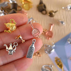 stino Metal Charms for Jewelry Making 100gram, Bulk Tibetan Silver & Gold Plated Trinkets for Earring Necklace Jewelry Making and Findings - color: Bottle Mixed Color