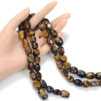 Adabele 45 Inch Natural Golden Yellow Tigers Eye Gemstone Tumbled Round Nugget Loose Beads 10mm-13mm Gem Stone Spacer for Craft Jewelry Making GZ4-11 - color: Tiger's Eye Stone, size: 45 Inch/3 Strands