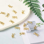 FASHEWELRY Golden Bow Connector Charms Bulk, Christmas Bowknot Link Charms, Infinity Links Geometric Hollow Bezel Pendants for Earring Bracelet Necklace Keychains Jewelry Making - color: Light Gold-Bowknot
