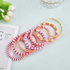 Ornaland 7Pcs Handmade Polymer Clay Heishi Surfer Stretch Bracelets Set Colorful Glass Beads Bracelets Boho Stackable Preppy Bracelets Wrist Jewelry for Women - color: rose Red