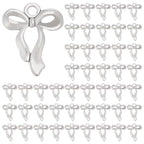 100Pcs Bowknot Charms, Alloy Bow Pendants Bowknot Jewelry Bulk Dangle Charms Elegant Earring Pendants for Earrings Necklace Bracelet Keychain Jewelry Making DIY Crafts - color: Antique Silver