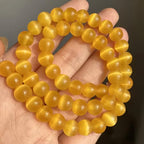 HAAMIIQII 6mm Golden Yellow Cat Eye Glass Round Crystal Stone Loose Gemstone Beads for Jewelry Making Bracelets Necklaces Earrings Crafts (60-65pcs) - color: Golden Yellow, size: 6mm (60pcs)