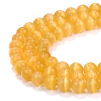 HAAMIIQII 6mm Golden Yellow Cat Eye Glass Round Crystal Stone Loose Gemstone Beads for Jewelry Making Bracelets Necklaces Earrings Crafts (60-65pcs) - color: Golden Yellow, size: 6mm (60pcs)