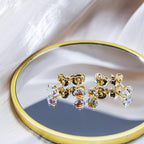 Nunpag 12 Pcs Ear Piercing Kit Disposable Ear Piercing Gun Kit with 4 Pcs 6 Prong Setting Cubic Zirconia Earrings Stud 316L Stainless Steel Easy to Use at Home Self Ear Piercer Gun Kit Tool - color: Gold-Rainbow