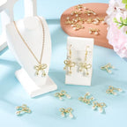 FASHEWELRY Golden Bow Connector Charms Bulk, Christmas Bowknot Link Charms, Infinity Links Geometric Hollow Bezel Pendants for Earring Bracelet Necklace Keychains Jewelry Making - color: Light Gold-Bowknot with Pearl