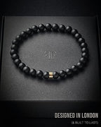 Forge & Foundry Men’s Matte Black Solid Onyx Beaded Bracelet | 10mm, 8mm, 6mm Bead Size Options | Signature Stainless Steel Engraved Bead | Andalus - color: 6mm Gold, size: Large