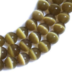 HAAMIIQII 6mm Brown Cat Eye Glass Round Crystal Stone Loose Gemstone Beads for Jewelry Making Bracelets Necklaces Earrings Crafts (60-65pcs) - color: Brown, size: 6mm (60pcs)