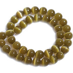 HAAMIIQII 10mm Brown Cat Eye Glass Round Crystal Stone Loose Gemstone Beads for Jewelry Making Bracelets Necklaces Earrings Crafts (35-40pcs) - color: Brown, size: 10mm (35pcs)