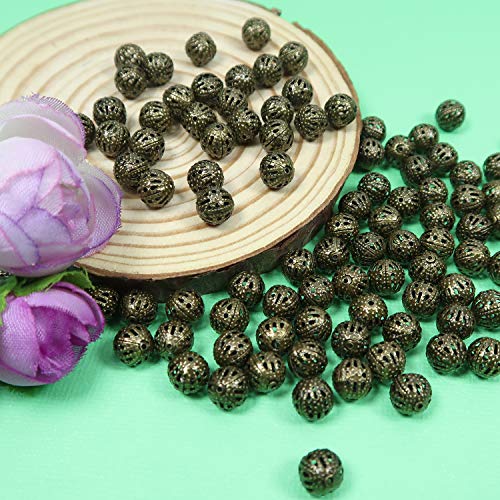 TOAOB 100pcs 8mm Antique Bronze Filigree Hollow Ball Beads Round Metal Loose Spacer Beads for DIY Crafts Bracelets Necklaces Earrings Jewelry Making - color: Antique bronze, size: 8mm
