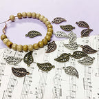 Heather's cf Four Leaf Clover Silver Leaf Beads 100-150 Pcs Leaves Craft Antique Leaf Charms for Crafting Leaf Pendant Charm for Necklace Bracelet Earring Making Fall Leaf Beads Set - color: Mixed Filigree Leaf