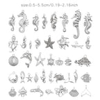 Julie Wang 90PCS Alloy Ocean Pendants Antique Silver Gold Tone Mermaid Tail Seahorses Shell Starfish Mixed Sea Charms for Necklace, Bracelet Summer Beach Jewelry Nautical Themed Craft Supplies - color: Antique Silver