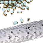 Glass Rice Beads Peacock Green 4x6mm 50pcs Faceted Oval Golden Edge Crystal Loose Beads for DIY Craft Jewelry Making - color: Peacock Green