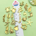 Sailanzi 100pcs Antique Golden Ocean Series Starfish Pendant Jewelry Making DIY Keychain Earrings Pendant Various Design Charms for Jewelry Making Bracelets Necklace (SN882) - color: SN882