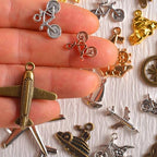 stino Metal Charms for Jewelry Making 100gram, Bulk Tibetan Silver & Gold Plated Trinkets for Earring Necklace Jewelry Making and Findings - color: Vehicle Silver & Gold