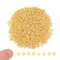 UNICRAFTALE 1000Pcs Spacer Beads Golden Flower Beads 4mm Metal Connector Beads Loose Beads Small Beads for DIY Bracelet Necklace Jewelry Making 1mm Hole - color: Golden
