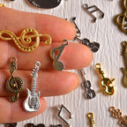 stino Metal Charms for Jewelry Making 100gram, Bulk Tibetan Silver & Gold Plated Trinkets for Earring Necklace Jewelry Making and Findings - color: Music Silver & Gold Bronze