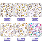 600Pcs Flat Round Vowel Letter Beads 7x4mm with Letter A E I O U Gold Letters White Acrylic Beads for Jewelry Making with Colorful Smiling Faces and Heart - color: Mixed Gold