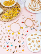 ZMLTLMG 552Pcs Gold Charm Bracelet Making Kit, Premium Paperclip Chain Jewelry Making Supplies with Enamel Charms, Letter Beads & Jump Rings, DIY Crafts Gift Set for Women Girls Adults