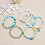 RISHEGAE Heishi Beaded Stretch Bracelets for Women Stackable Polymer Clay Beads Bracelets Friendship Boho Summer Beach Bracelet Jewelry Set - color: F-Blue Flower