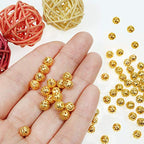 TOAOB 100pcs Gold Spacer Beads 6mm Filigree Hollow Ball Beads Round Metal Loose Beads for DIY Crafts Bracelets Necklaces Earrings Jewelry Making - color: Gold, size: 6mm