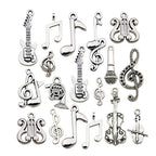 Youdiyla 70pcs Musical Symbol Charms Collection, BULK Music Notes Elements Guitar Violin Microphon Tape Horn Charms Metal Pendant Craft Supplies Findings for Jewelry Making-Silver HM211 - color: Silver Music Charms-70pcs