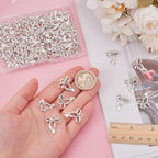 100Pcs Bowknot Charms, Alloy Bow Pendants Bowknot Jewelry Bulk Dangle Charms Elegant Earring Pendants for Earrings Necklace Bracelet Keychain Jewelry Making DIY Crafts - color: Antique Silver