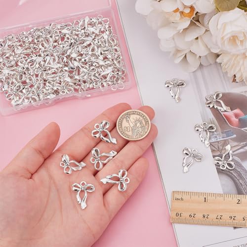 100Pcs Bowknot Charms, Alloy Bow Pendants Bowknot Jewelry Bulk Dangle Charms Elegant Earring Pendants for Earrings Necklace Bracelet Keychain Jewelry Making DIY Crafts - color: Antique Silver