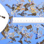 stino Metal Charms for Jewelry Making 100gram, Bulk Tibetan Silver & Gold Plated Trinkets for Earring Necklace Jewelry Making and Findings - color: Music Silver & Gold Bronze