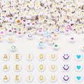 600Pcs Flat Round Vowel Letter Beads 7x4mm with Letter A E I O U Gold Letters White Acrylic Beads for Jewelry Making with Colorful Smiling Faces and Heart - color: Mixed Gold