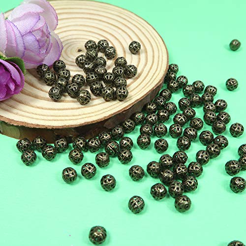 TOAOB 100pcs 6mm Antique Bronze Filigree Hollow Ball Beads Round Metal Loose Spacer Beads for DIY Crafts Bracelets Necklaces Earrings Jewelry Making - color: Antique bronze, size: 6mm