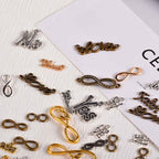 stino Metal Charms for Jewelry Making 100gram, Bulk Tibetan Silver & Gold Plated Trinkets for Earring Necklace Jewelry Making and Findings - color: Words Silver & Gold