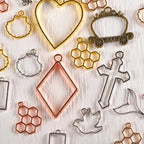 stino Metal Charms for Jewelry Making 100gram, Bulk Tibetan Silver & Gold Plated Trinkets for Earring Necklace Jewelry Making and Findings - color: Bezels Frame Silver & Bronze Glod