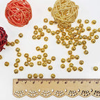 TOAOB 100pcs Gold Spacer Beads 6mm Filigree Hollow Ball Beads Round Metal Loose Beads for DIY Crafts Bracelets Necklaces Earrings Jewelry Making - color: Gold, size: 6mm