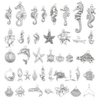 Julie Wang 90PCS Alloy Ocean Pendants Antique Silver Gold Tone Mermaid Tail Seahorses Shell Starfish Mixed Sea Charms for Necklace, Bracelet Summer Beach Jewelry Nautical Themed Craft Supplies - color: Antique Silver