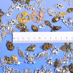 stino 100 G Mixed Style Metal Charms for Jewelry Making, Bulk Silver & Gold Plated, for Bracelet, Necklace, Earrings DIY Crafts - style: Skull