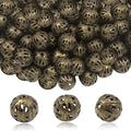 TOAOB 100pcs 8mm Antique Bronze Filigree Hollow Ball Beads Round Metal Loose Spacer Beads for DIY Crafts Bracelets Necklaces Earrings Jewelry Making - color: Antique bronze, size: 8mm