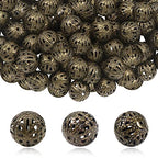 TOAOB 100pcs 10mm Antique Bronze Filigree Hollow Ball Beads Round Metal Loose Spacer Beads for DIY Crafts Bracelets Necklaces Earrings Jewelry Making - color: Antique bronze, size: 10mm