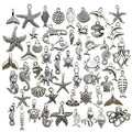 Youdiyla 100pcs Summer Beach Charms Collection, Bulk Marine Sea Animal Life Nautical Charms Metal Pendant Craft Supplies Findings for Necklace and Bracelet Jewelry Making (HM292) - color: Summer Beach Charm-100pcs