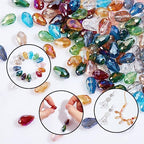 AHANDMAKER 140 Pcs Faceted Teardrop Glass Beads, 14 Colors Clear Waterdrop Crystal Glass Beads Center Drilled Drop Spacer Beads for DIY Craft Jewelry Necklace Bracelet Earring Making, Hole: 1mm - color: 14 Colors Waterdrop