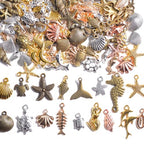 stino 100g Metal Pendant Charms for Jewelry Making, Bulk Silver & Gold Plated Charms for Braclet Necklace Crafts, Animal Plant Flower Pet and so on - color: Sea Life Silver & Gold