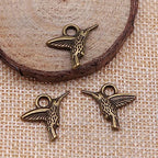50PCS Small Hummingbird Charms Alloy Mini Hummingbird Charms 3D Animal Alloy Hummingbird Enamel Pendants for Earring Necklace Bracelet Keychain Jewelry Craft Making - color: Bronze