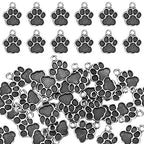 Junkin 120 Pieces Dog Paw Print Charms Animal Footprint Pendants 15x12 mm Metal Puppy Prints Charms for Jewelry Making DIY Necklace Bracelet(Ancient Silver)